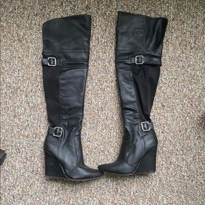 Thigh high wedged boots